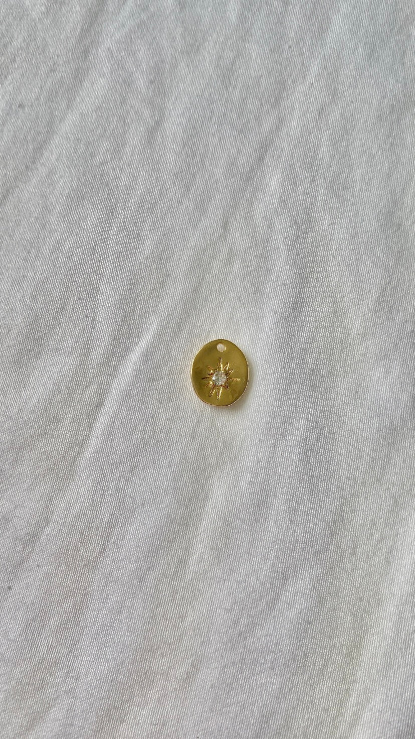 charm rond + étoile des vents