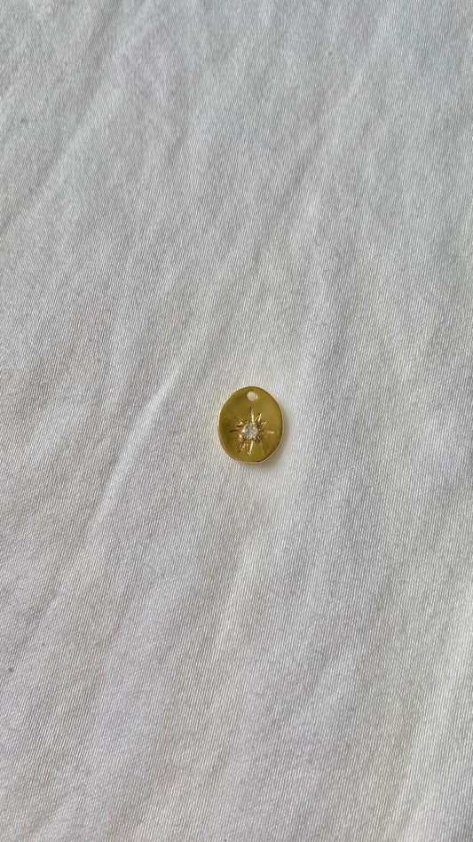 charm rond + étoile des vents